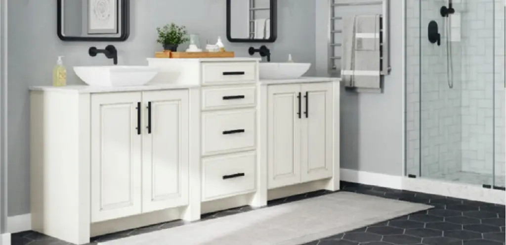 A White Wooden Bathroom Vanity With Mirror