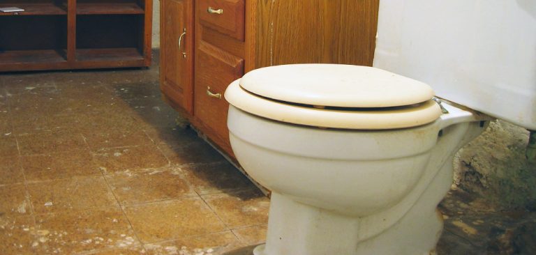 A Old Toilet Commode without Waste Pipe